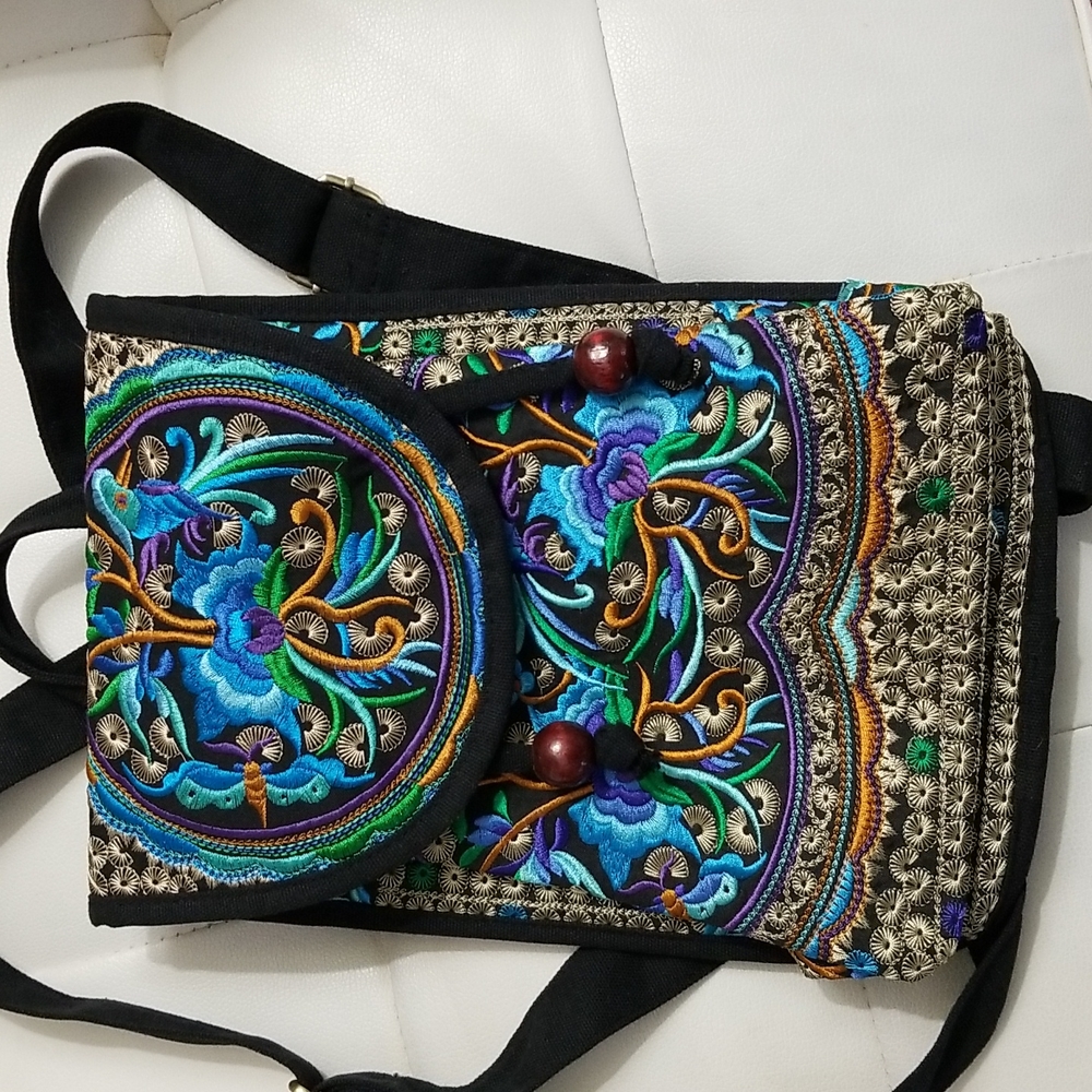 NWOT. Embroidered backpack